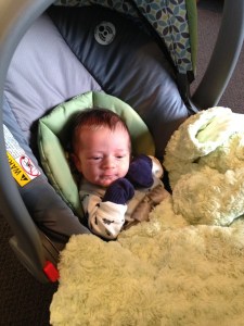 Before the "appointment", Owen is wearing socks on his hands because we forgot his mittens at home!