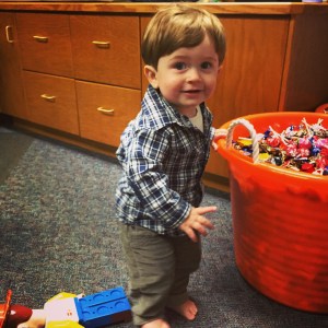 Checking out the candy for Fall Fest in Daddy's office