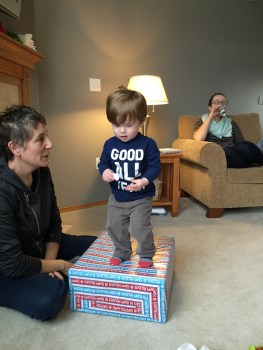 Showing off his box standing skills on Grandma's Christmas present