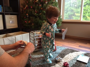 This picture sums us Owen's love for Christmas - "I have a piece of wrapping paper!"