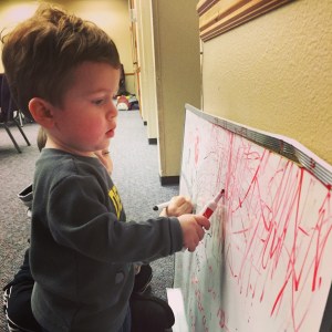 He has discovered the white board thanks to the kiddos are church