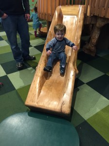 Big boy going down the slide