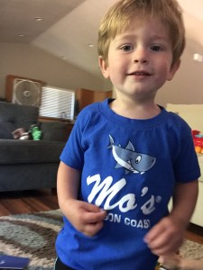 Owen is obsessed with this shark shirt from our vacation. He requests to wear it and cries when we take it off. He has the same reaction to any clothes that have trucks on them. 