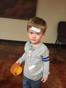At the MOPS social, Owen put Harper's name tag on his forehed and would not let it be taken off. Not a great pic for smiling, but the silly memory was documented!
