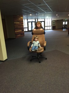 Playing with Nana at church! Chair rides are so much fun!